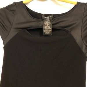 Preowned but good condition Bebe dress, size S.